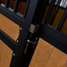 9' x 10' pre-built bamboo horse stall with vertical bar top, sliding door, powder-coated steel frame, and U-shaped opening for horse comfort – ideal for barns and stables.