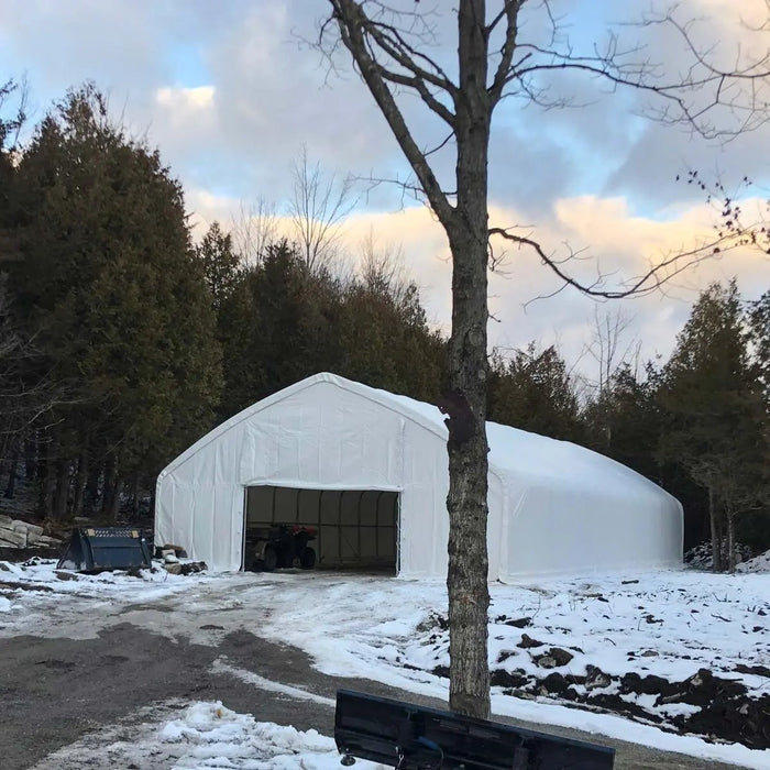 TMG Industrial 30' x 50' Straight Wall Peak Ceiling Storage Shelter with Heavy Duty 17 oz PVC Cover & Drive Through Doors, TMG-ST3050V