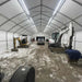 TMG Industrial 30' x 50' Straight Wall Peak Ceiling Storage Shelter with Heavy Duty 17 oz PVC Cover & Drive Through Doors, TMG-ST3050V
