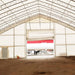 TMG Industrial Pro Series 70' x 100' Dual Truss Storage Shelter with Heavy Duty 32 oz PVC Cover & Drive Through Doors, TMG-DT70100-PRO