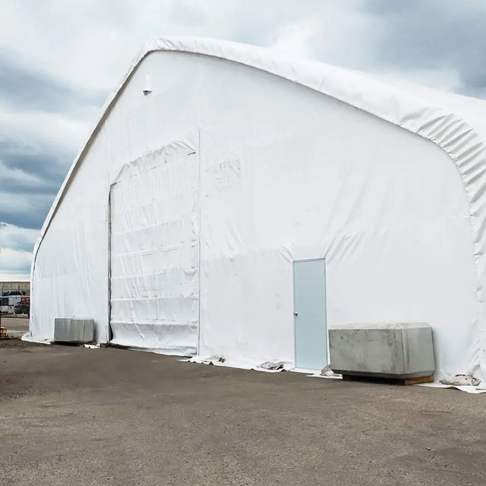 TMG Industrial Pro Series 70' x 150' Dual Truss Storage Shelter with Heavy Duty 32 oz PVC Cover & Drive Through Doors, TMG-DT70150-PRO