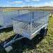 Variant 7’ Heavy Duty Utility Tilt Trailer with Extended Mesh Sides & Net Cover, Removable Tailgate, 4.2’x7’ Tilt Bed, MFR #: S205Tiltmesh, Made in Canada